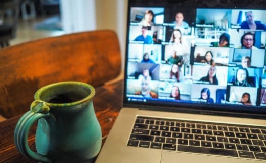 macbook pro displaying group of people